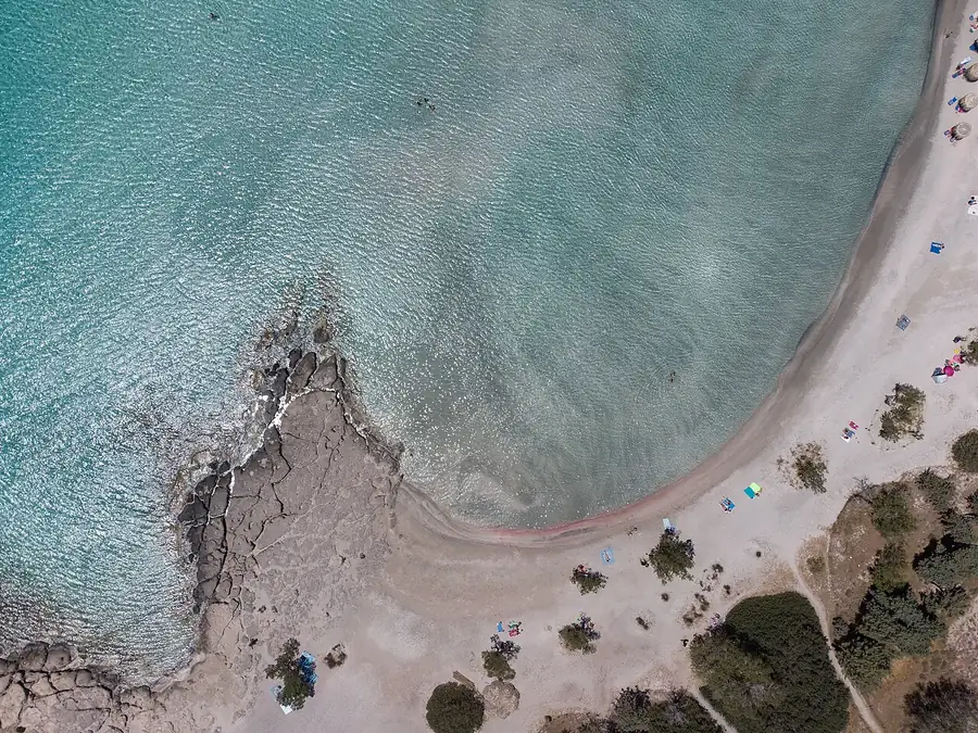 The pink sand and shallow water at Elafonisi, in the far south-west of Crete